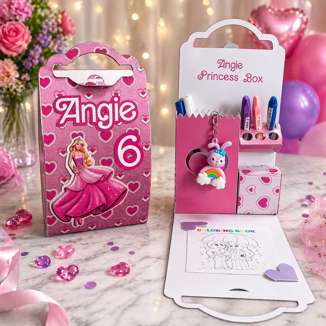 Princess-themed gift box with stationery items and a coloring book on a decorative surface.
